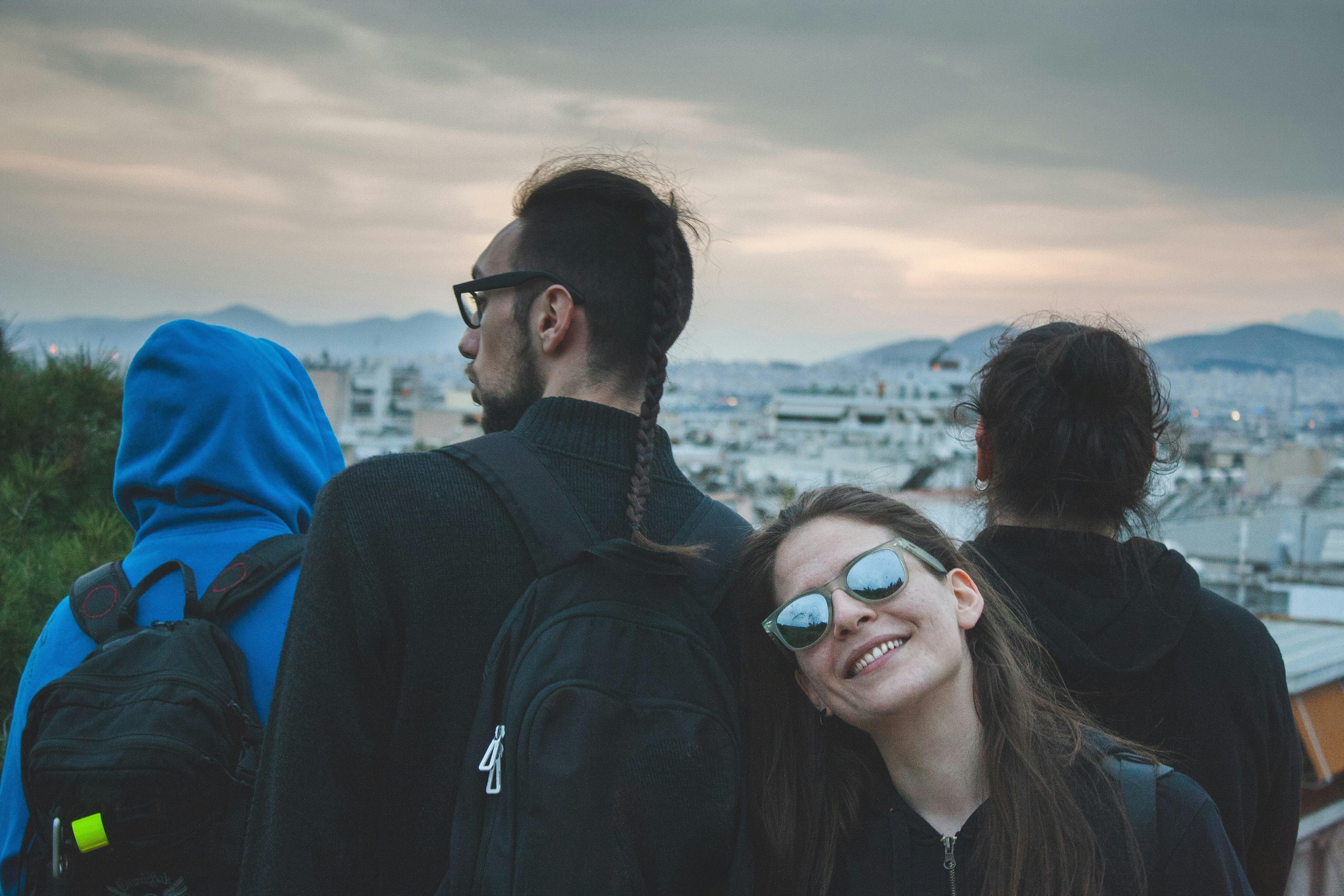 man in black jacket beside woman in blue jacket